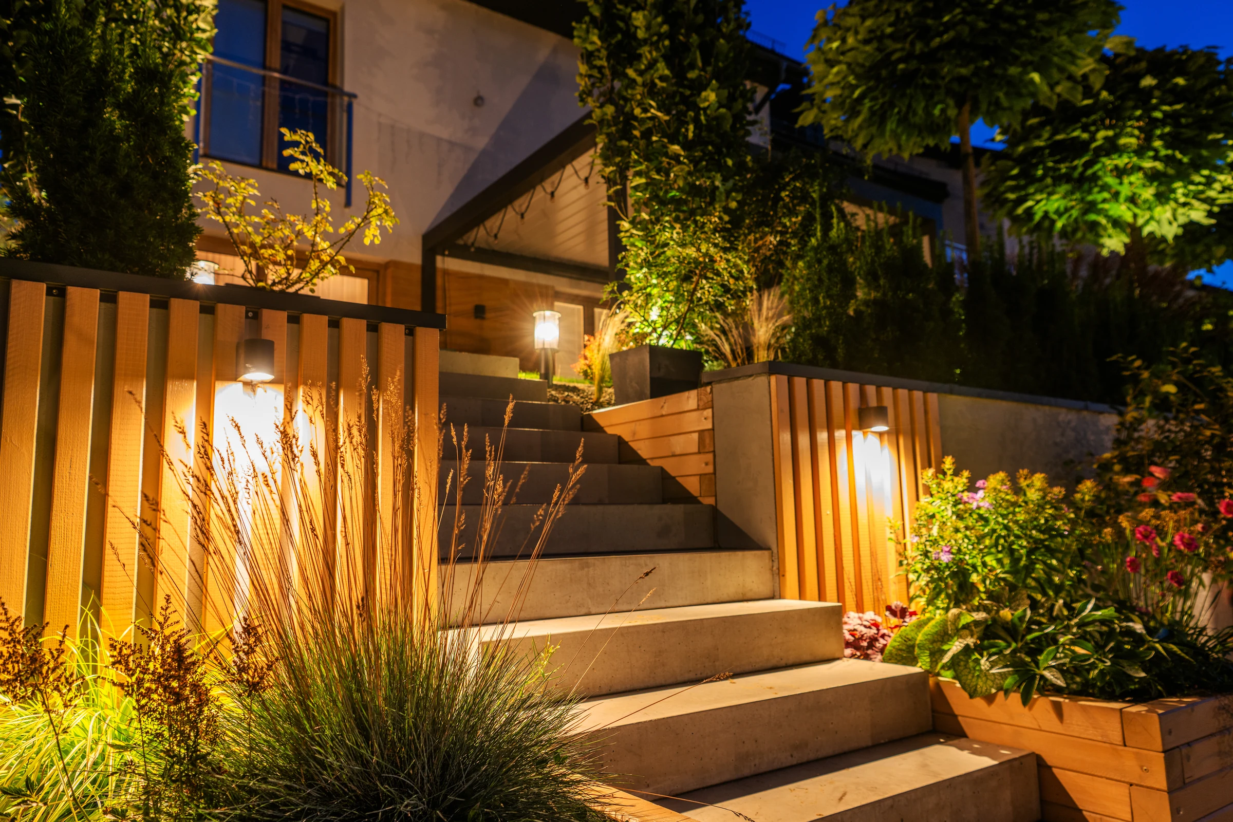 Modern home entrance with illuminated outdoor steps